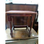 A mahogany stool