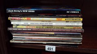 A collection of graphic novels and comic