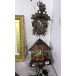 2 cuckoo clocks