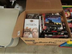 A box of CD's, DVD's and Videos includin