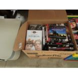 A box of CD's, DVD's and Videos includin