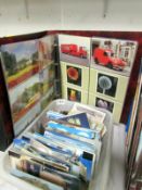 A tray and an album of postcards