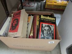 A box of books including biographies