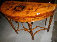 A half round satinwood table with painte