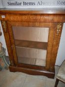 A Victorian inlaid cabinet