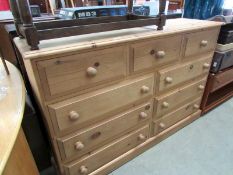 A solid pine 9 drawer chest