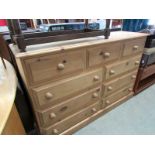 A solid pine 9 drawer chest