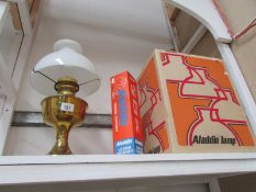 A brass Aladdin oil lamp in original box