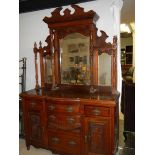 A mahogany mirror back sideboard