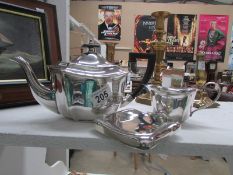 A silver plate teapot, milk jug and hip