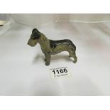 A 1930's cold painted Airedale Terrier d