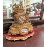 A French mantel clock with porcelain pan