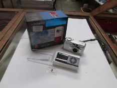 A Polaroid D610 camera, and Ipad Nano an