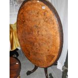 A Victorian oval inlaid mahogany loo tab