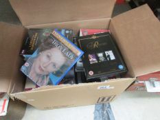 A box of DVD's and videos