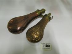 2 copper and brass gun powder flasks, 1