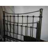 A Victorian brass and iron bedstead