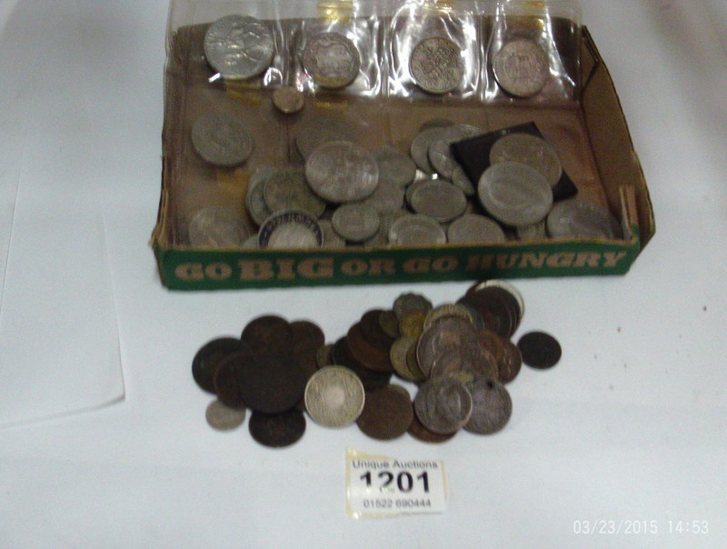 A mixed lot of British and foreign coins