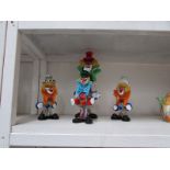 4 coloured glass clowns