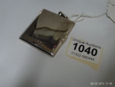 A silver photo case hallmarked Birmingha
