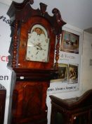 A large mahogany Grandfather clock with