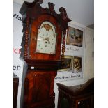 A large mahogany Grandfather clock with