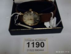 A gold Tissot Gent's wrist watch