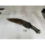 A Kukri with skinning knives