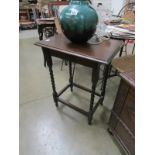 An oak barleytwist leg occasional table