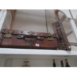 2 old leather suitcases