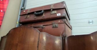 2 leather suitcases