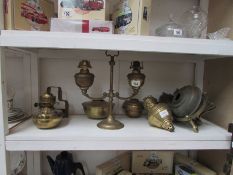 A quantity of brass oil lamp parts