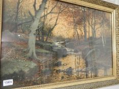A gilt framed and glazed forest river sc