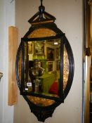 A Victorian ebonised Aesthetic movement wall mirror