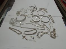 A mixed lot of silver and white metal je