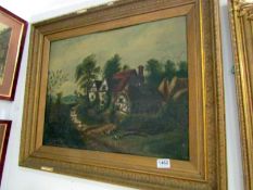 An oil on board cottage scene