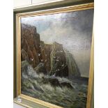 A framed oil on canvas cliffs with seagu