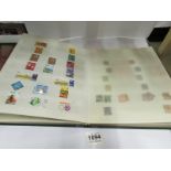 4 albums of mainly world stamps