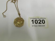 A 9ct gold locket on chain