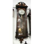 A mahogany Vienna wall clock