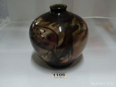 A Cobridge stoneware vase depicting deer