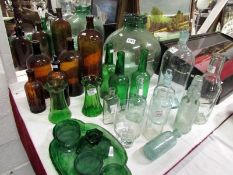 A mixed lotof old bottles, vases and tri