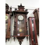 A Victorian mahogany Vienna wall clock