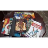 A collection of graphic novels and comic