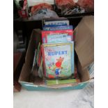 A box of children's books including Rupe