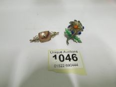 A Victorian gold and agate brooch togeth