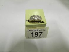 An 18ct gold 6.7gm diamond ring, size M