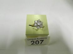 A 1.80cts yellow gold daisy diamond ring