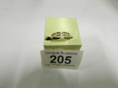 A 30pts 18ct yellow gold channel cut dia