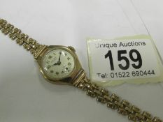 A ladies 9ct gold wristwatch marked 'Car